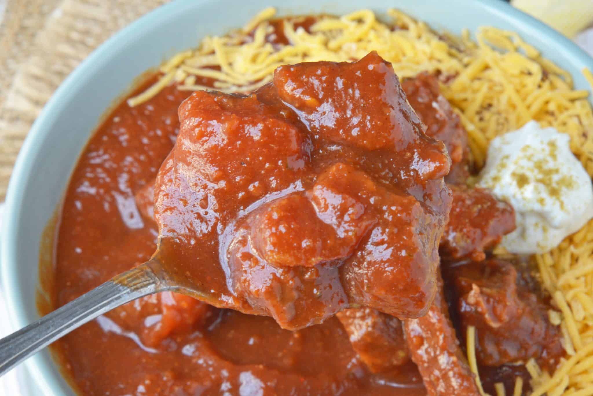 Red Beef Chili uses chunks of steak and simmers them to tender perfection in a chili tomato sauce. Serve over rice, noodles or as a stew. #bestchilirecipe #bobbyflay #redbeefchili www.savoryexperiments.com