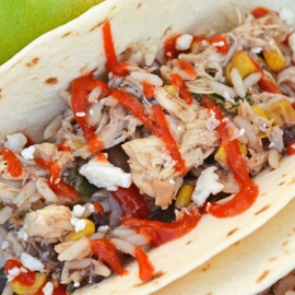 Slow Cooker Chicken Tacos only take 10 minutes to make in the crock pot! Just set it and forget it for a delicious dinner! #shreddedchickentacos #chickenstreettacos #softtacos www.savoryexperiments.com