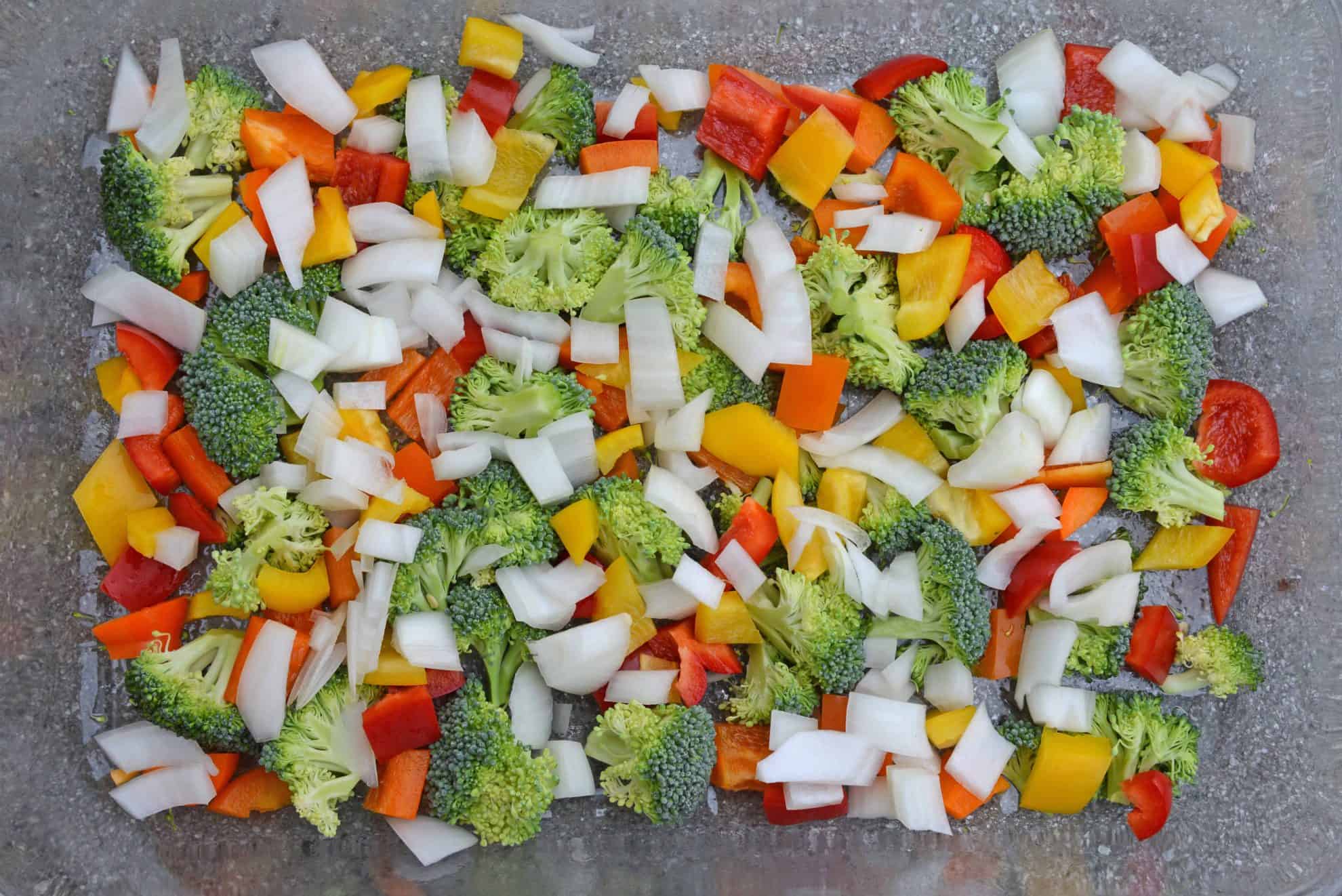 Cheesy Vegetable Breakfast Casserole uses fluffy eggs with broccoli, bell pepper, onion and cheese to make a delightful breakfast that is perfect for feeding a crowd! #vegetablecasserole #breakfastcasserole www.savoryexperiments.com 