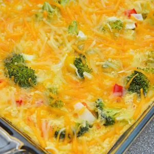 Cheesy Vegetable Breakfast Casserole uses fluffy eggs with broccoli, bell pepper, onion and cheese to make a delightful breakfast that is perfect for feeding a crowd! #vegetablecasserole #breakfastcasserole www.savoryexperiments.com