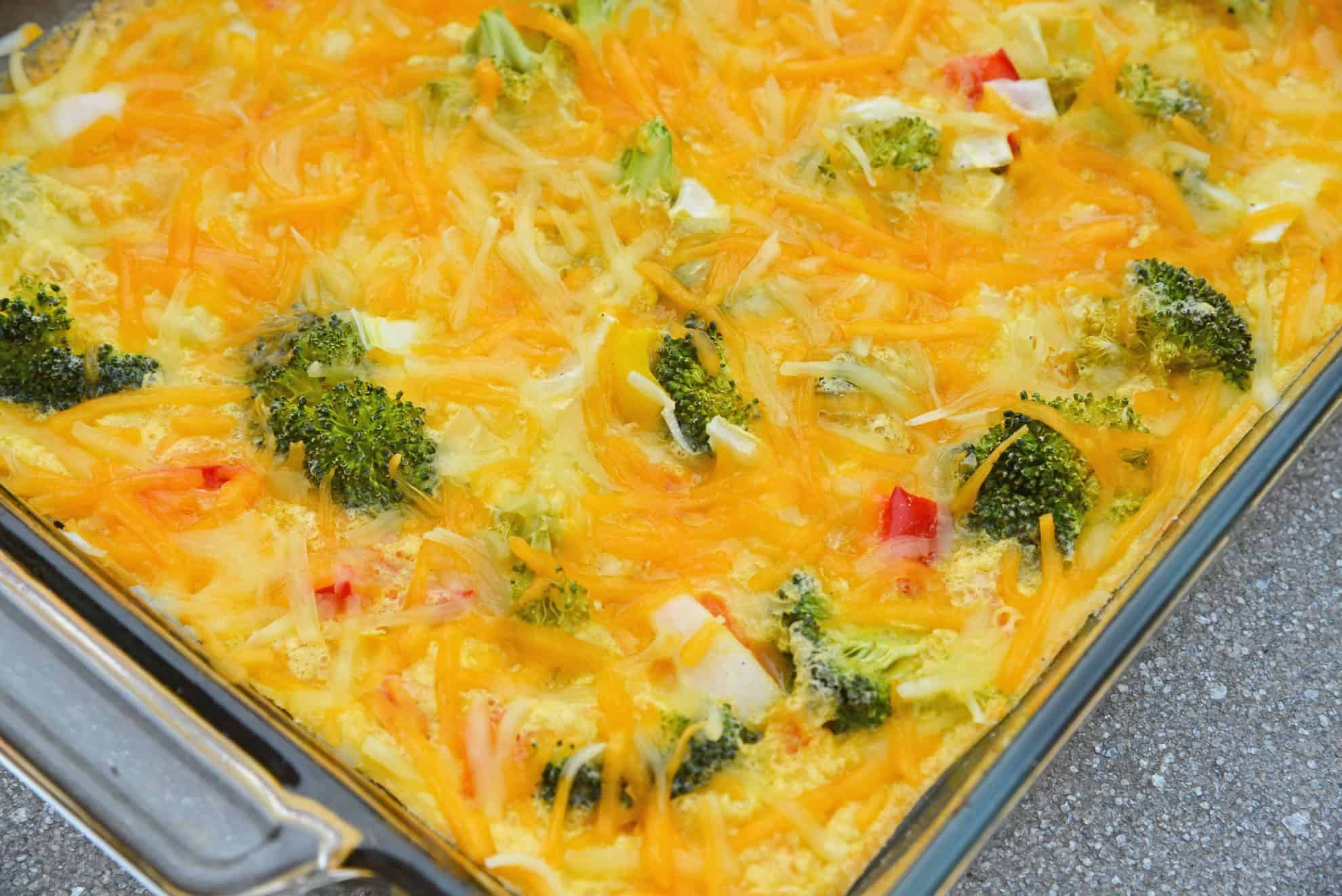 Cheesy Vegetable Breakfast Casserole uses fluffy eggs with broccoli, bell pepper, onion and cheese to make a delightful breakfast that is perfect for feeding a crowd! #vegetablecasserole #breakfastcasserole www.savoryexperiments.com 