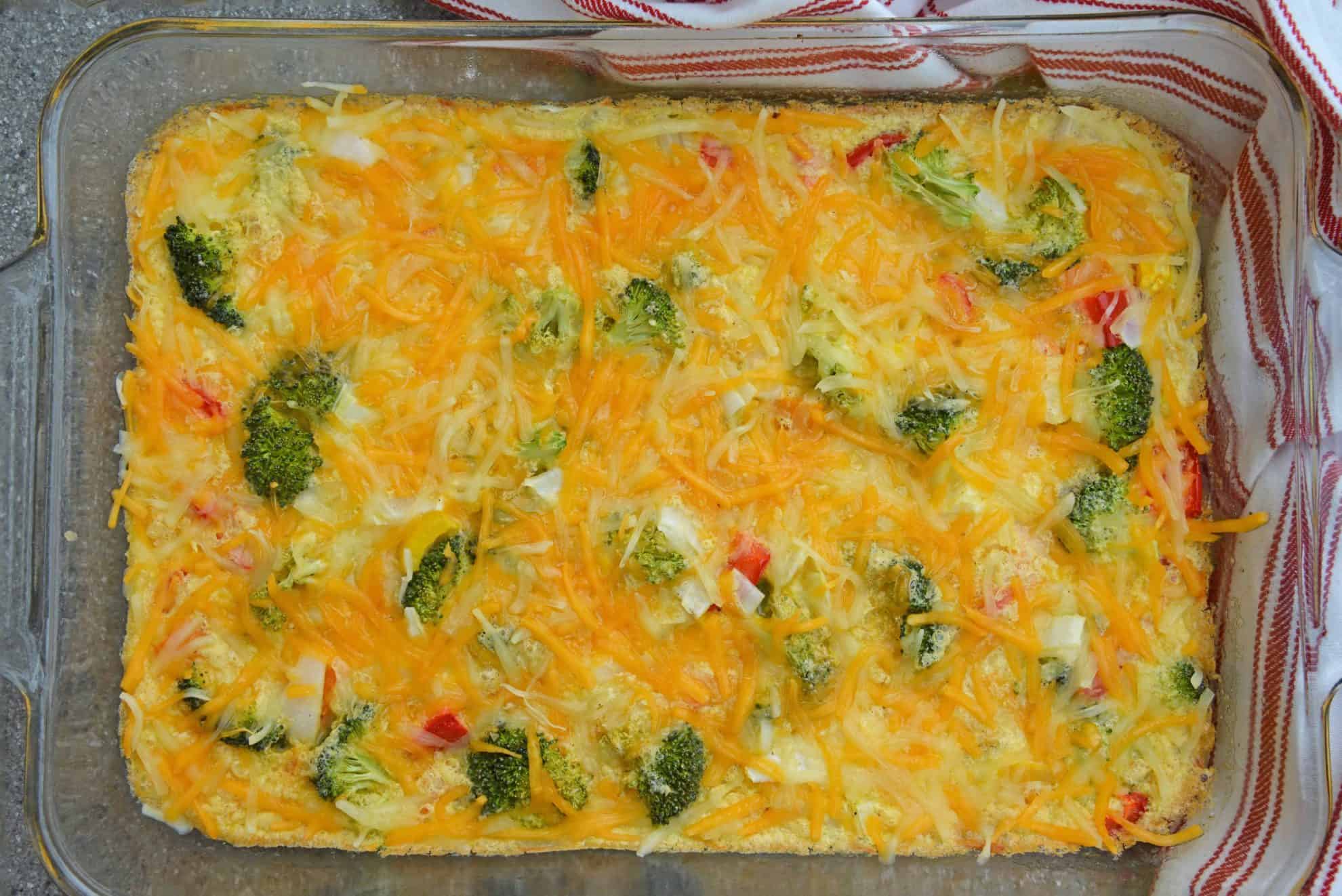 Cheesy Vegetable Breakfast Casserole uses fluffy eggs with broccoli, bell pepper, onion and cheese to make a delightful breakfast that is perfect for feeding a crowd! #vegetablecasserole #breakfastcasserole www.savoryexperiments.com 