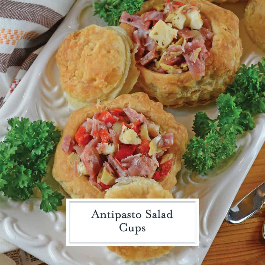 Antipasto Salad Cups are made of chopped salami, prosciutto, sopressata, mozzarella cheese, peppadews and artichokes. The best way to eat salad with your fingers!