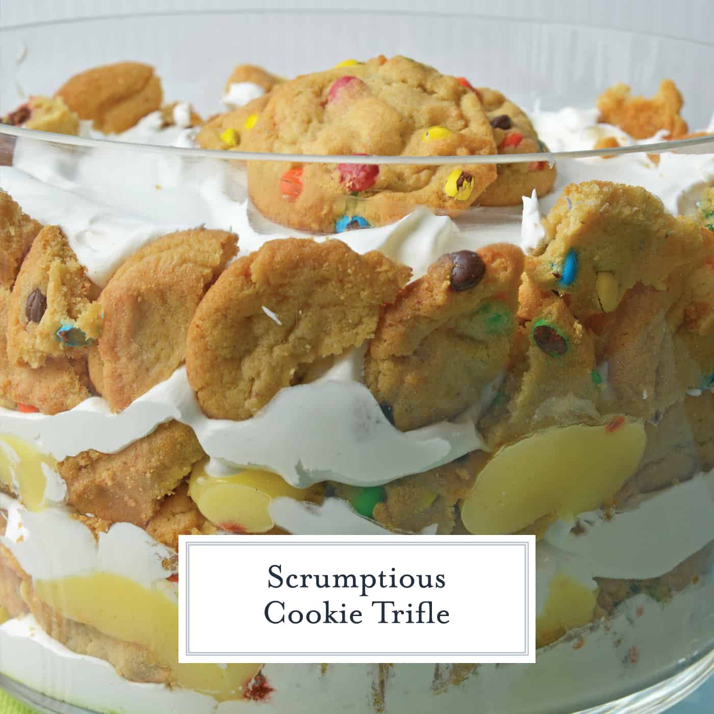 This Cookie Trifle recipe is a super easy trifle recipe that only uses 3 ingredients! Chocolate and butterscotch chip cookies, layered with vanilla custard and whipped cream! #cookiebomb #cookietrifle #triflerecipe www.savoryexperiments.com