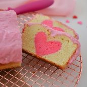 overhead of sliced peek-a-boo pound cake with hearts