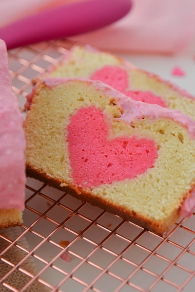 overhead of sliced peek-a-boo pound cake with hearts