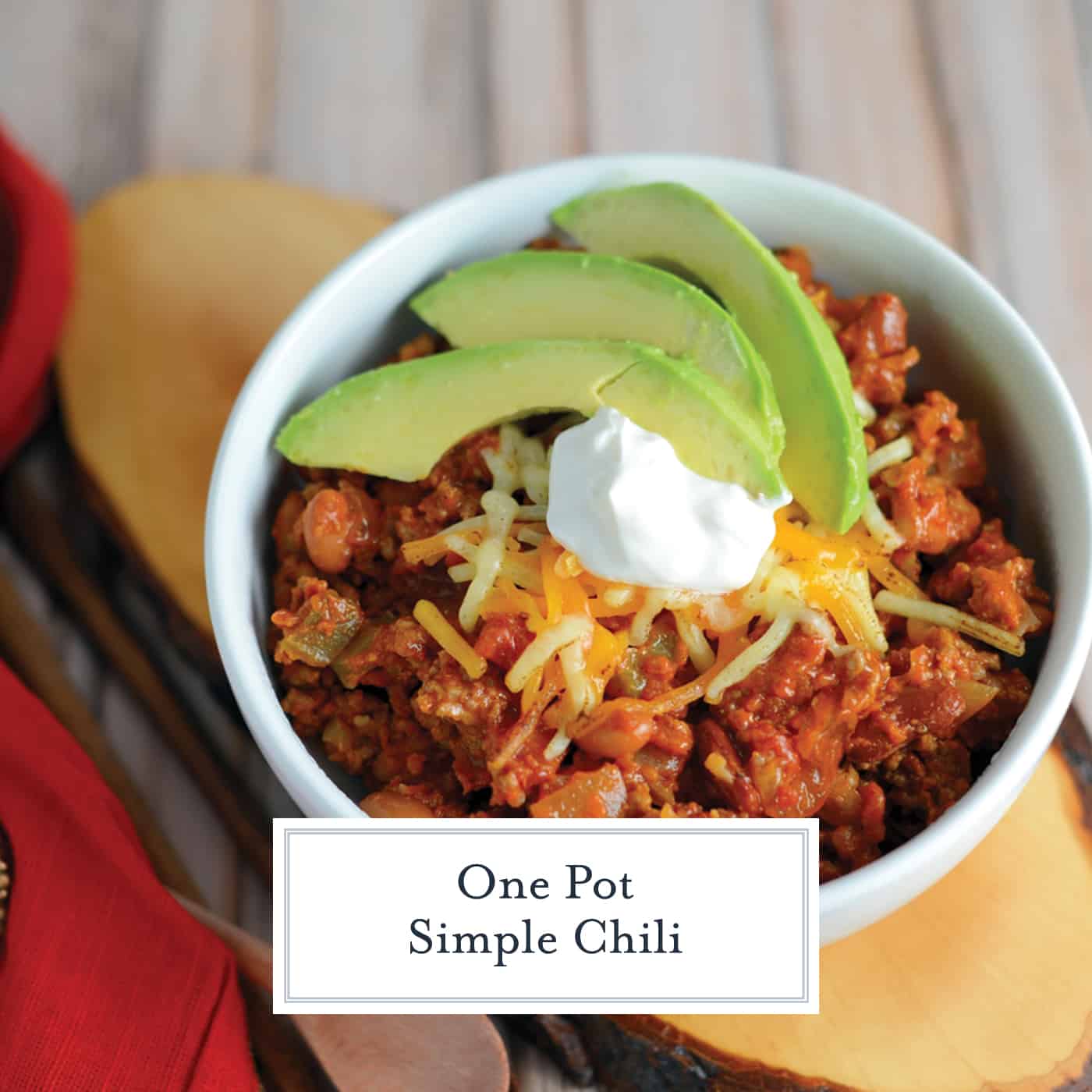 This Simple Chili only takes 30 minutes to throw together and will leave you wanting more. Lean beef, a blend of beans and spices, plus tomatoes and peppers make this packed with healthy ingredients. #simplechili #homemadechili #easychilirecipe www.savoryexperiments.com