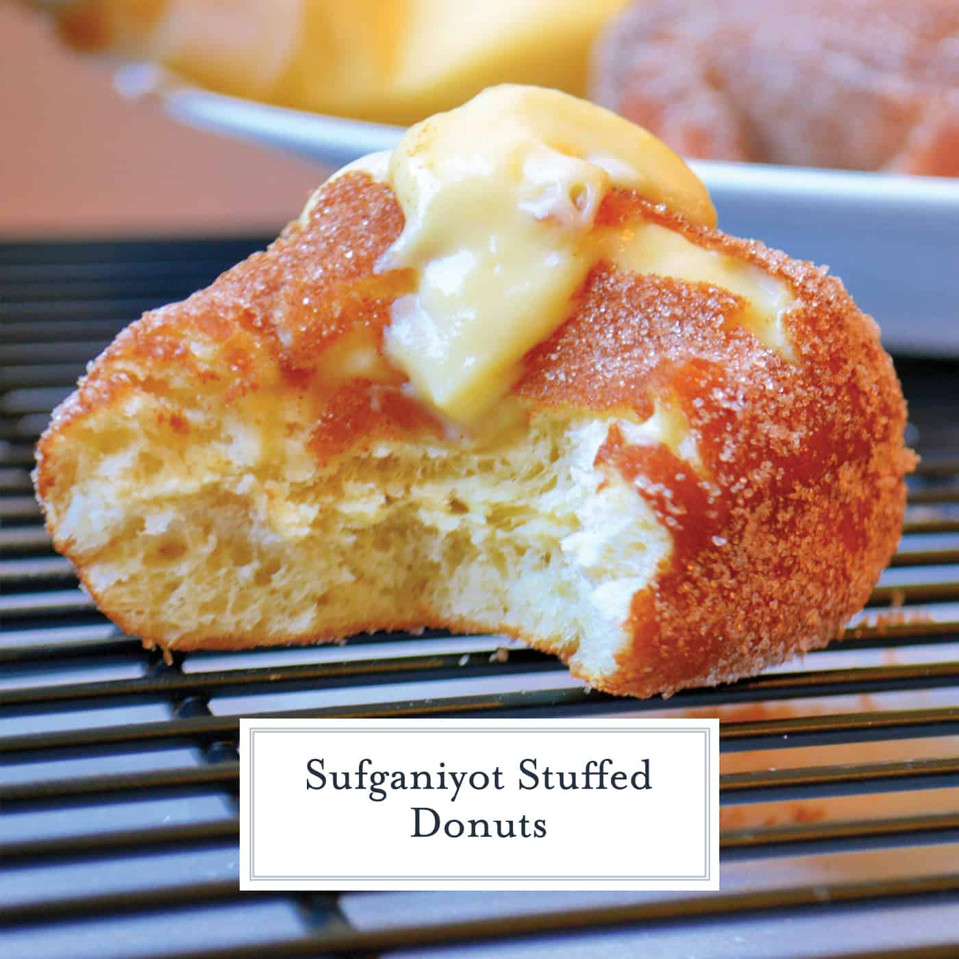 Sufganiyot Stuffed Donuts let you prepare warm & fresh strawberry jelly & vanilla custard stuffed donuts at home! Light & fluffy dough with a hint of sugar! #donutrecipe #stuffeddonuts #easysufganiyotrecipe www.savoryexperiments.com