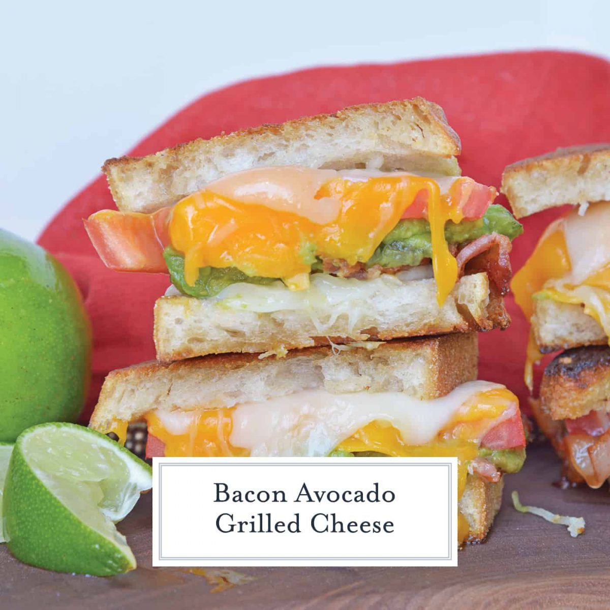 Bacon Avocado Grilled Cheese Sandwiches are made from a three cheese blend along with zesty guacamole, lime, and bacon, for out of this world sandwich experience! #howtomakegrilledcheese #gourmetgrilledcheese #avocadogrilledcheese www.savoryexperiments.com