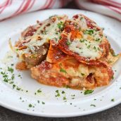 Giant No Boil Lasagna is made up of layers of spinach, tomato, turkey sausage, and lots of CHEESE! This is the best homemade lasagna for a crowd! #howtomakelasagna #homemadelasagnaforacrowd www.savoryexperiments.com