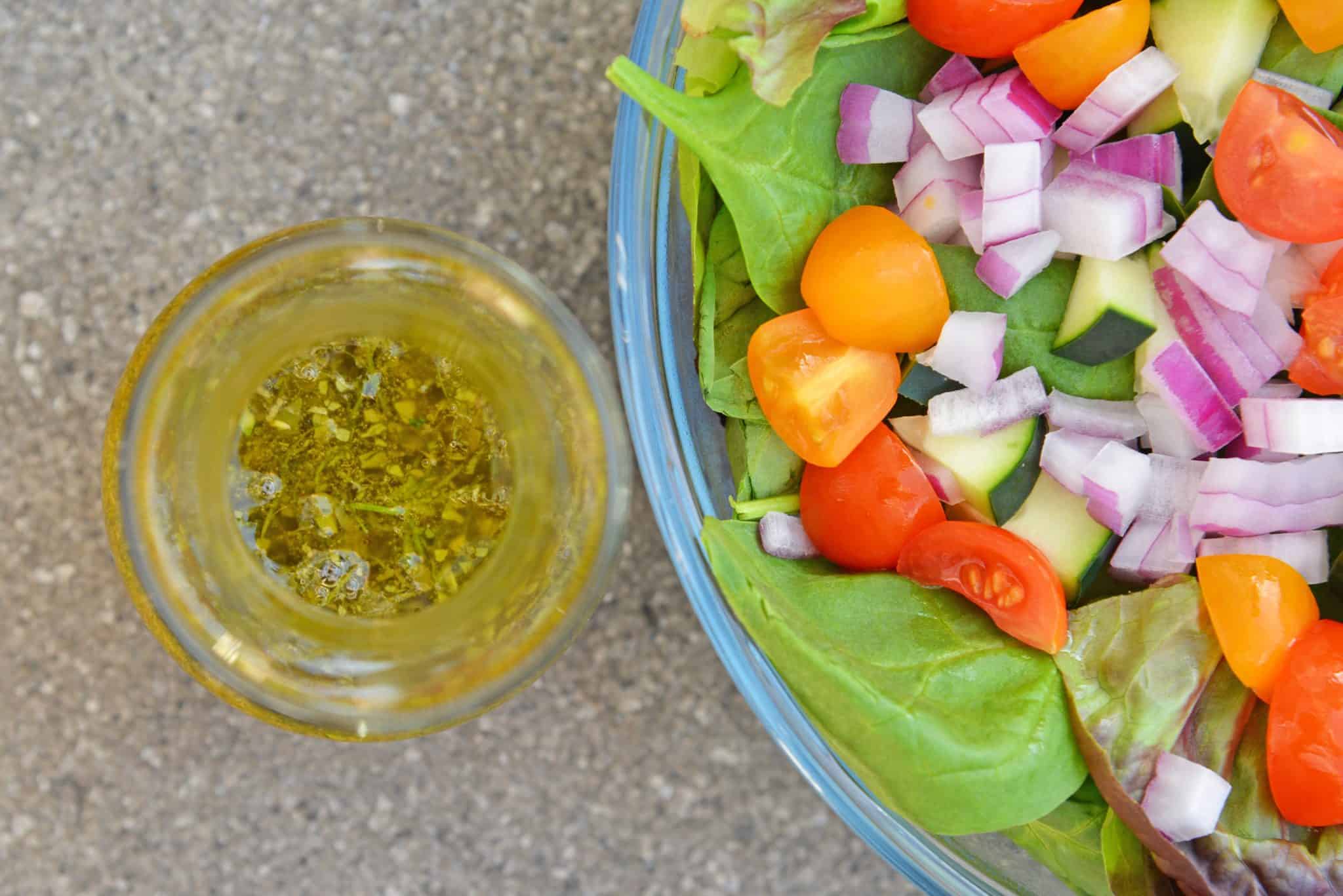 This Red Wine Vinaigrette is a deliciously easy homemade salad dressing recipe, taking only a fraction of the time it takes for you to chop up a salad! #vinaigretterecipe #redwinevinaigrette #vinaigrettedressing www.savoryexperiments.com