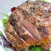 Leg of Lamb is an easy lamb recipe using a layer of fresh herbs and seasonings and high temperatures sear to form a nice crust leaving the instead nice and juicy. #legoflamb #roastlamb #easterlamb www.savoryexperiments.com