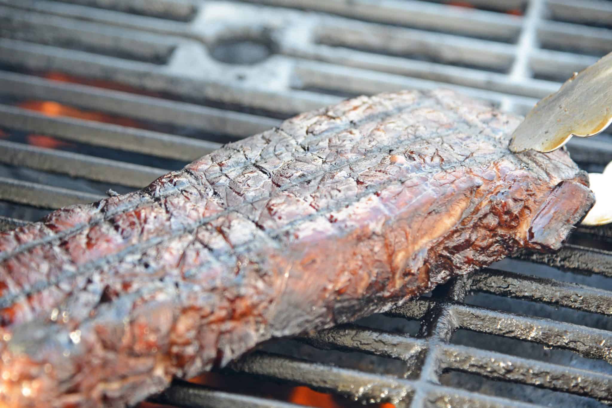 searing a whiskey steak recipe on the grill 