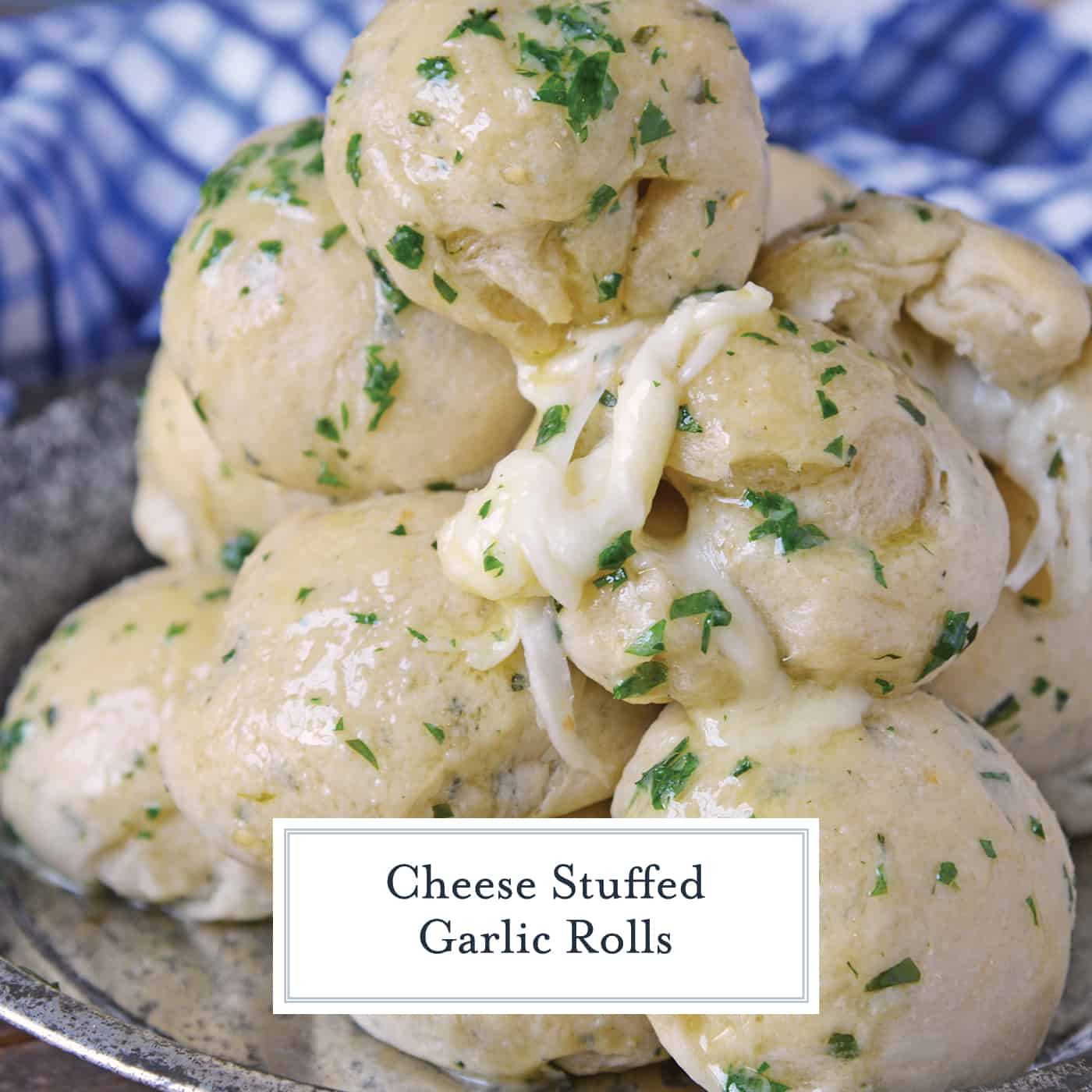 These Cheese Stuffed Garlic Rolls are delicious garlic and parsley rolls stuffed with gooey mozzarella cheese. Eat them plain or with a side of marinara.