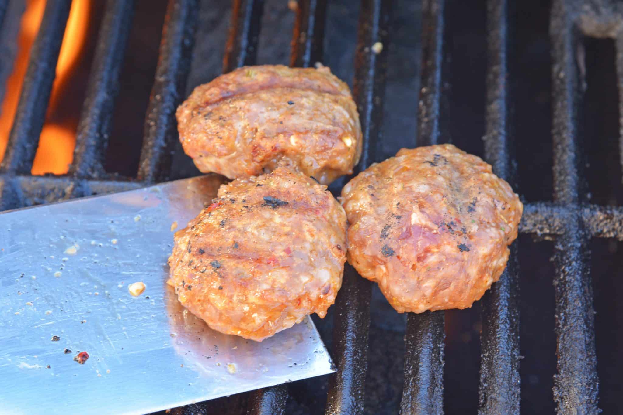 These Italian Sausage Sandwich Sliders are easy to prepare and even easier to eat. Featuring pork sausage and Hawaiian rolls, they are sure to impress. #italiansausagesandwichsliders #hawaiianrollsliders www.savoryexperiments.com