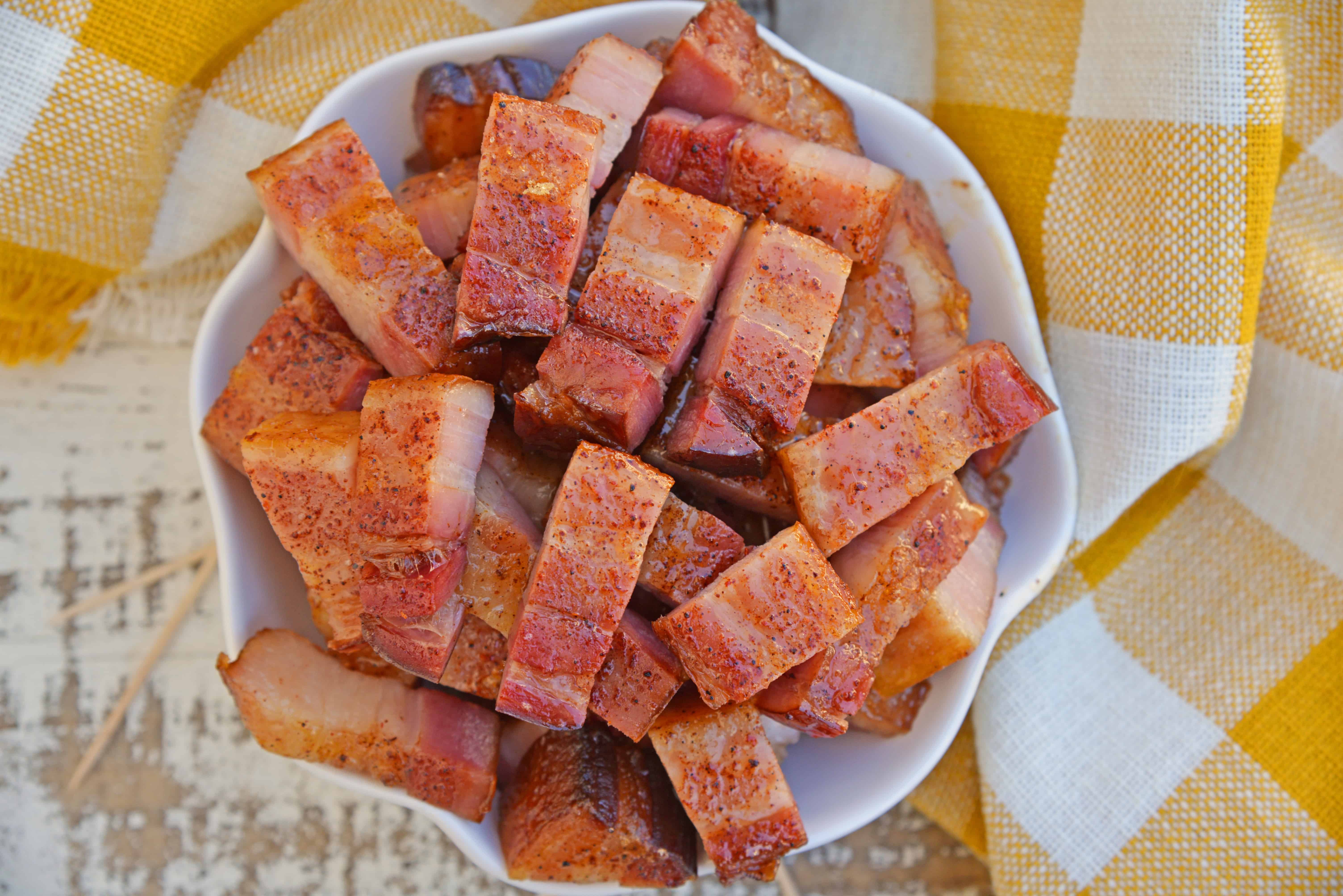 Candied bacon is the best sweet and salty snack with a kick. Serve as strips or bites, bacon is caramelized with brown sugar and and a touch of heat. #candiedbacon #pigcandy #brownsugarbacon www.savoryexperiments.com