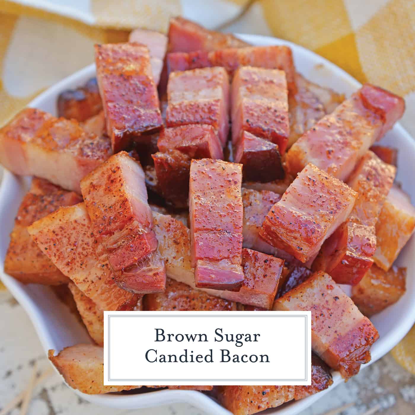 Candied bacon is the best sweet and salty snack with a kick. Serve as strips or bites, bacon is caramelized with brown sugar and and a touch of heat. #candiedbacon #pigcandy #brownsugarbacon www.savoryexperiments.com