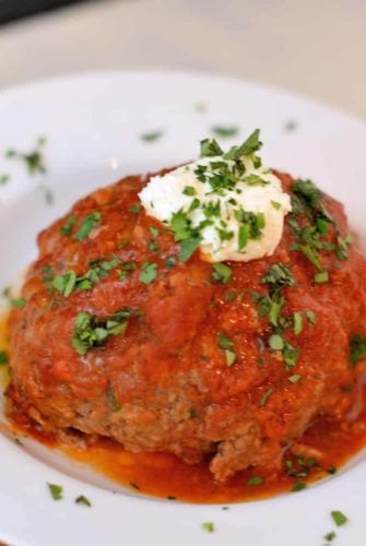 The LAVO One Pound Meatballs are a visual showstopper for any meal. They also happen to be the best giant meatballs you will ever eat. #lavoonepoundmeatballs #meatballs www.savoryexperiments.com