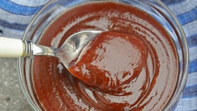 Chipotle Honey BBQ Sauce is a delicious recipe that will leave you with your very own homemade BBQ sauce! Slightly sweet and slightly spicy, it tastes perfect on anything that needs homemade BBQ sauce. #BBQsauce #homemadeBBQsauce www.savoryexperiments.com