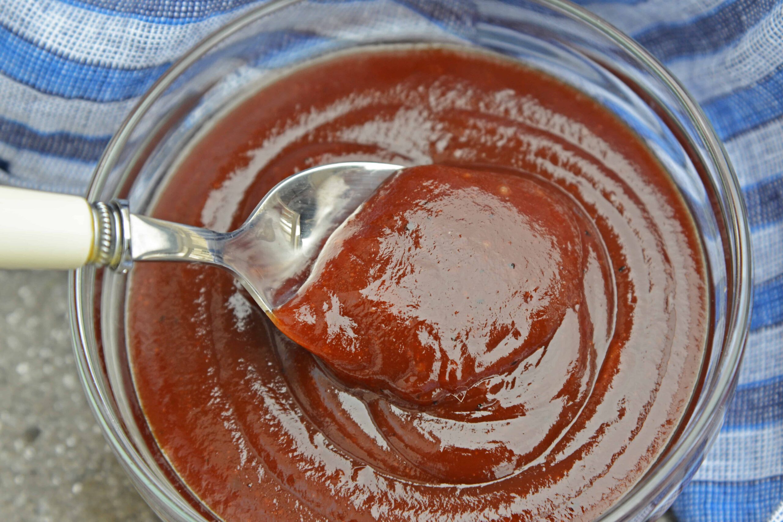 Chipotle Honey BBQ Sauce is a delicious recipe that will leave you with your very own homemade BBQ sauce! Slightly sweet and slightly spicy, it tastes perfect on anything that needs homemade BBQ sauce. #BBQsauce #homemadeBBQsauce www.savoryexperiments.com