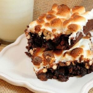 S'more Brownies is a delicious homemade brownie recipe made from double chocolate brownies, a layer of crunchy, salty pretzels and gooey melted marshmallows! #smoresbrownies #homemadebrownies www.savoryexperiments.com