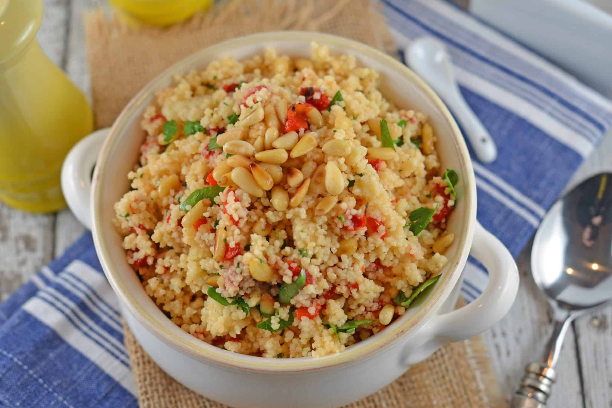 Italian Couscous is an easy side dish recipe perfect for serving with any meal. Sun dried tomatoes, garlic and pinenuts spruce up the dish!