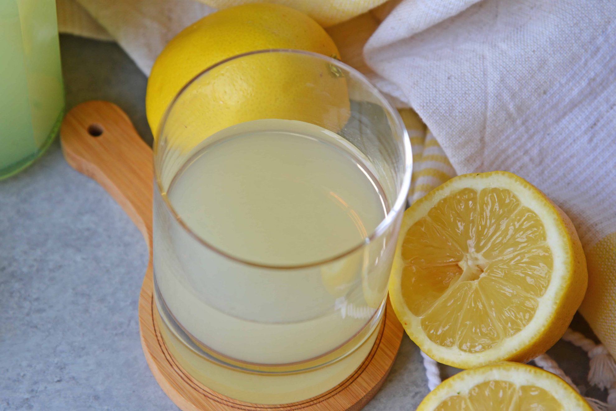 overhead angle limoncello with fresh lemons 