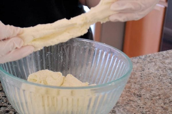 Homemade Mozzarella Cheese is a mix of science and cooking. With a velvety texture and packed with flavor, you will be making it all the time. #homemademozzarellacheese #mozzarella #cheese www.savoryexperiments.com