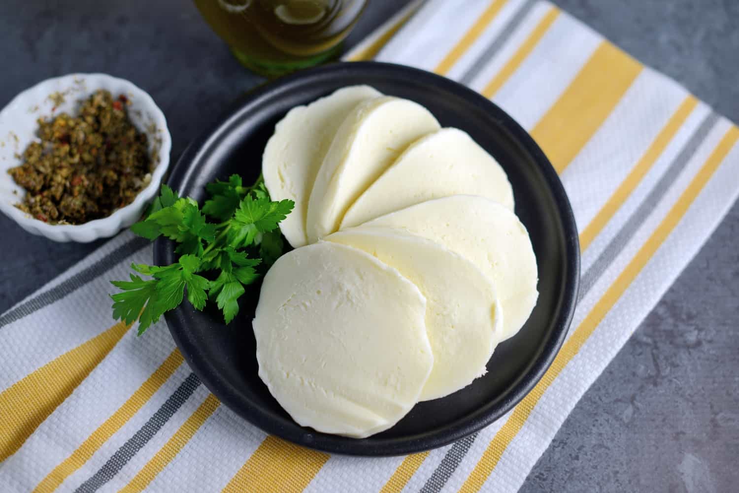 overhead shot of plate of sliced mozzarella