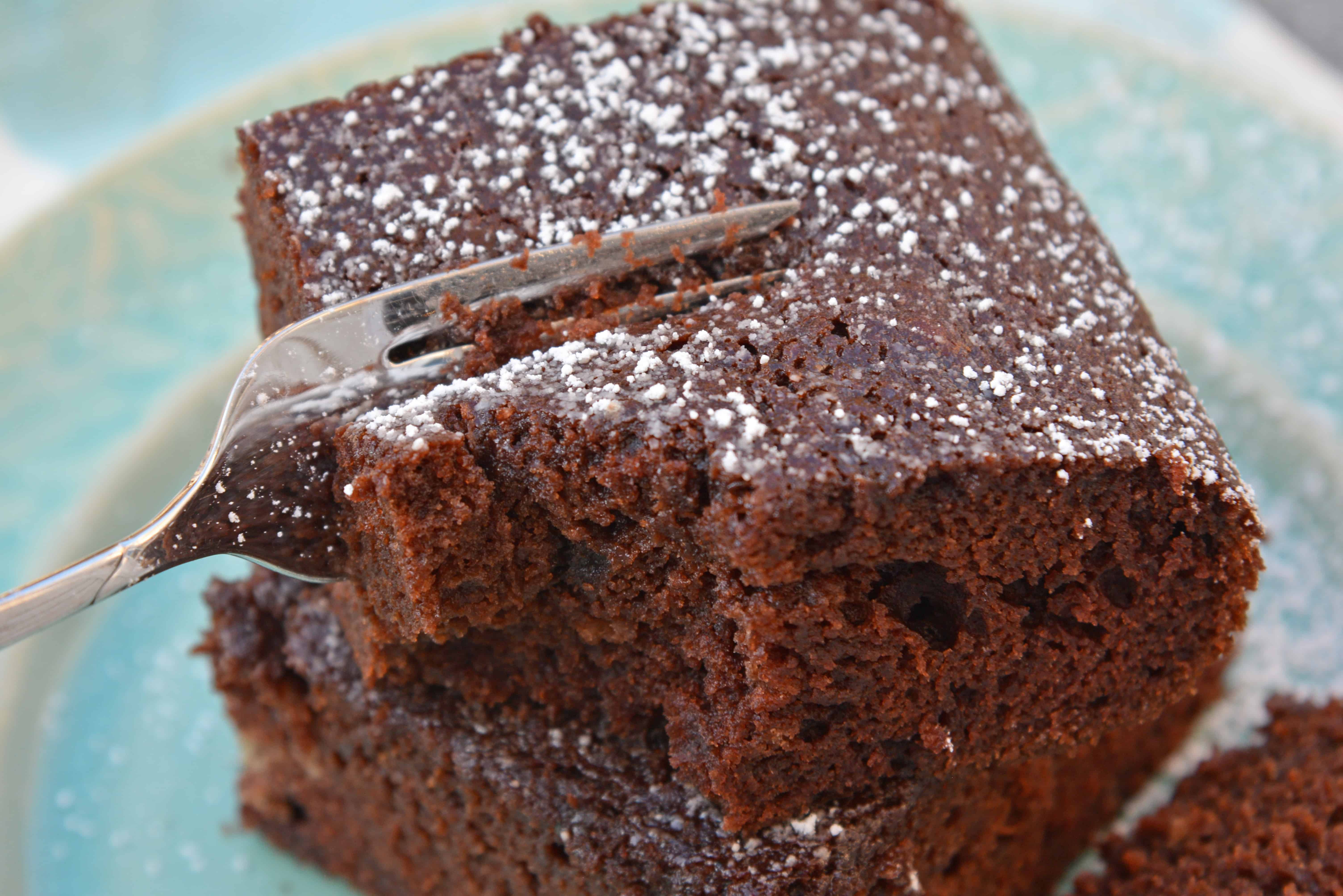 This Chocolate Beet Cake hides an entire serving of veggies inside a moist, rich chocolate cake! This is the best beet cake that you will ever make! #chocolatecakerecipe #beetcake #chocolatebeetcake www.savoryexperiments.com