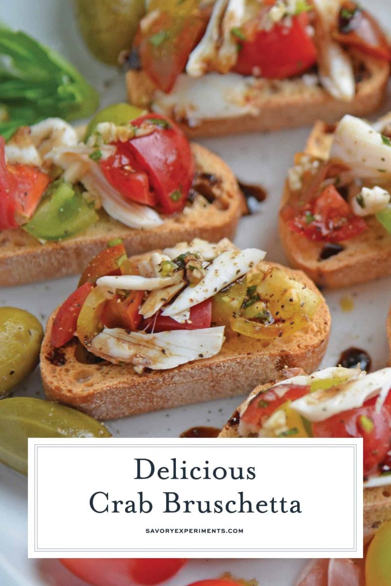 Crab Bruschetta is a mound of fresh tomatoes, garlic basil and buttery crab meat piled high on crispy toast. This is one of the best appetizers out there! #crabbruschetta #easybruschetta www.savoryexperiments.com