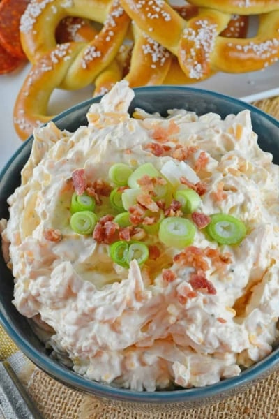 Beer Cheese Dip is an easy, spreadable, zesty pub cheese great for serving with soft pretzels, crackers, carrots, celery sticks or chips! #beercheesedip #beercheesepretzeldip www.savoryexperiments.com