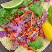 Korean Beef Tacos are stuffed with seasoned bulgogi beef, fresh veggies, and spicy sauce! These are the best Korean tacos you will ever eat! Easy and tasty! #Koreanbeeftacos #bulgogitacos www.savoryexperiments.com