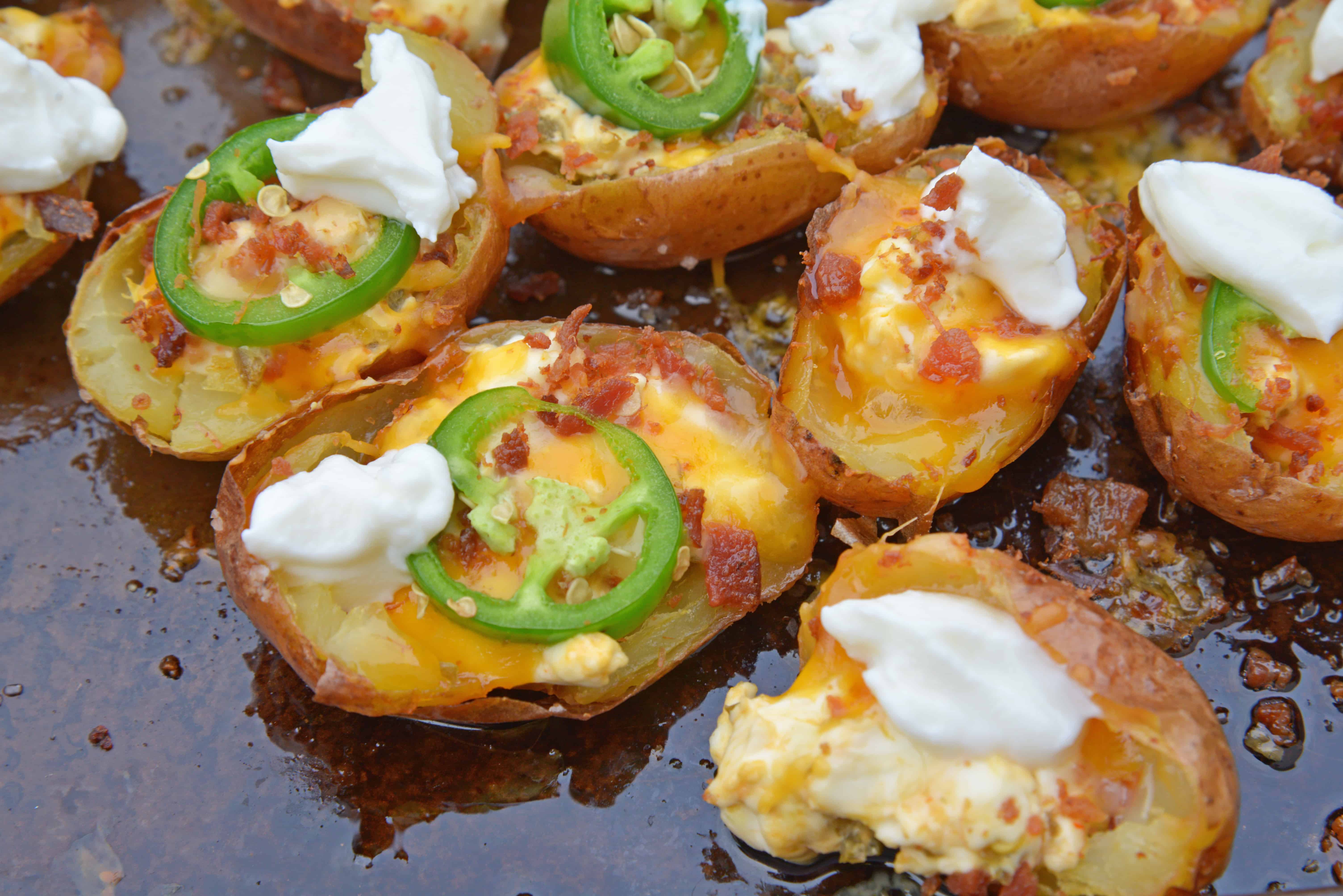Jalapeno Popper Potato Skins are bite-sized potatoes filled with 3 types of cheese, fresh jalapenos, bacon and cooled off with sour cream. Perfect for a snack or party appetizer! #potatoskins #jalapenopoppers www.savoryexperiments.com
