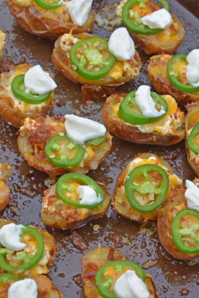 jalapeno popper potato skins on a baking sheet