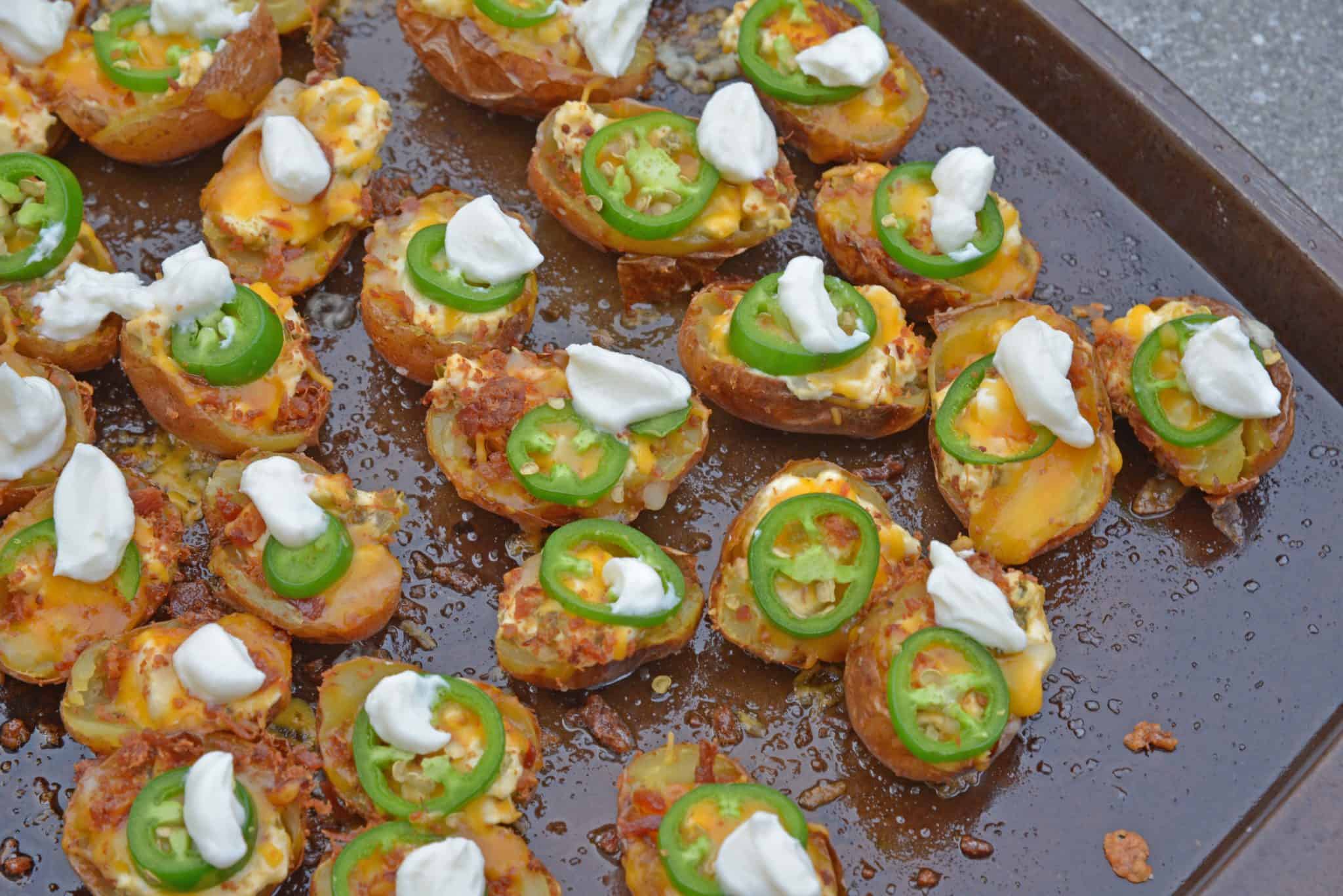 jalapeno popper potato skins on a baking sheet