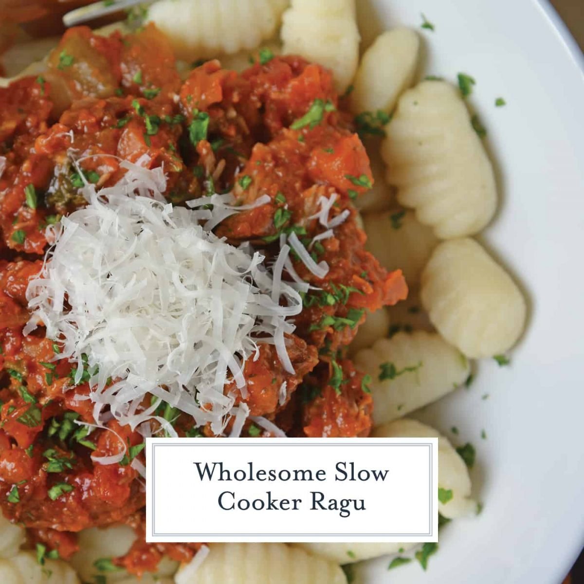 Slow Cooker Ragu uses a blend of 7 vegetables with shredded pork and flavorful spices to make a hearty and delicious ragu sauce. Serve over pasta. Also freezer friendly! #slowcookerragu #slowcookerrecipes www.savoryexperiments.com