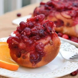 Cranberry-Orange Sticky Buns- Festive and tasty, cranberry-orange sticky buns make for the perfect holiday breakfast! #stickybuns #breakfast #cranberries www.savoryexperiments.com