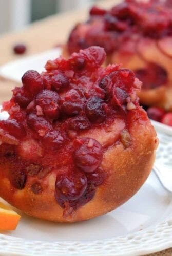 Cranberry-Orange Sticky Buns- Festive and tasty, cranberry-orange sticky buns make for the perfect holiday breakfast! #stickybuns #breakfast #cranberries www.savoryexperiments.com