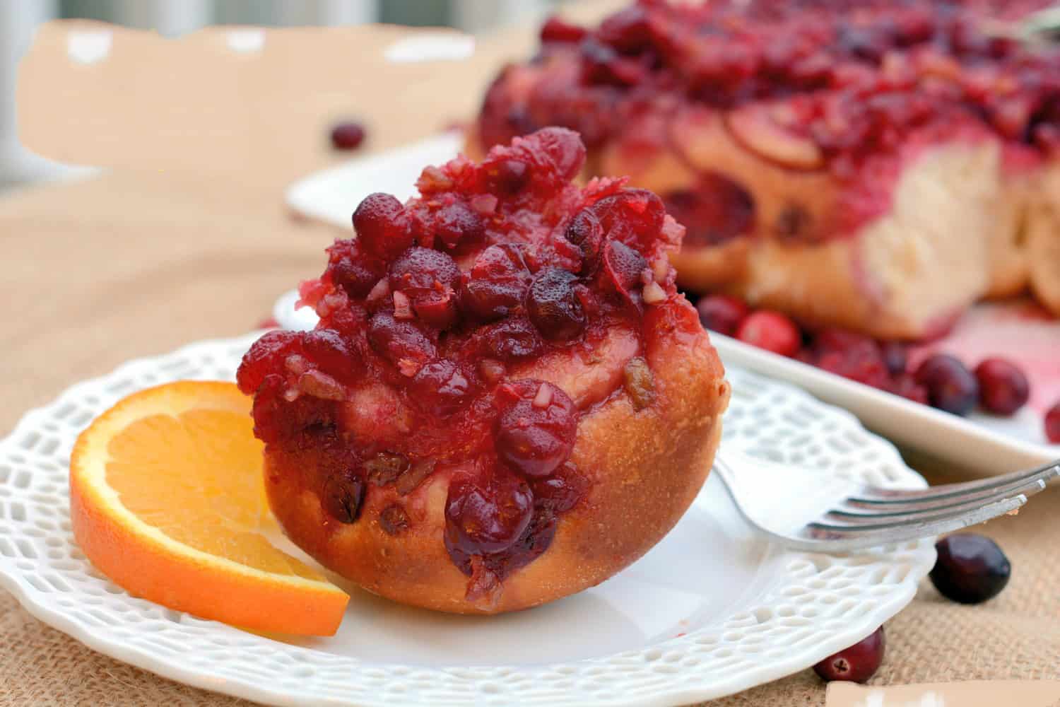 Cranberry sweet rolls are perfect for any holiday breakfast or even dessert. Orange cranberry bread in sweet roll form is an award winning recipe! #cranberrysweetrolls www.savoryexperiments.com 