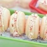 Peppermint Twist Macarons- The perfect chewy and slightly sweet holiday cookie treat. #macarons #christmascookies www.savoryexperiments.com