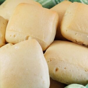 Even if you have never had Texas Roadhouse Rolls, you'll love these soft, pillow-like, buttery sweet dinner rolls. They are super easy to make! #texasroadhouserolls #dinnerrolls www.savoryexperiments.com