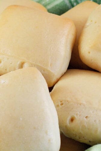 Even if you have never had Texas Roadhouse Rolls, you'll love these soft, pillow-like, buttery sweet dinner rolls. They are super easy to make! #texasroadhouserolls #dinnerrolls www.savoryexperiments.com