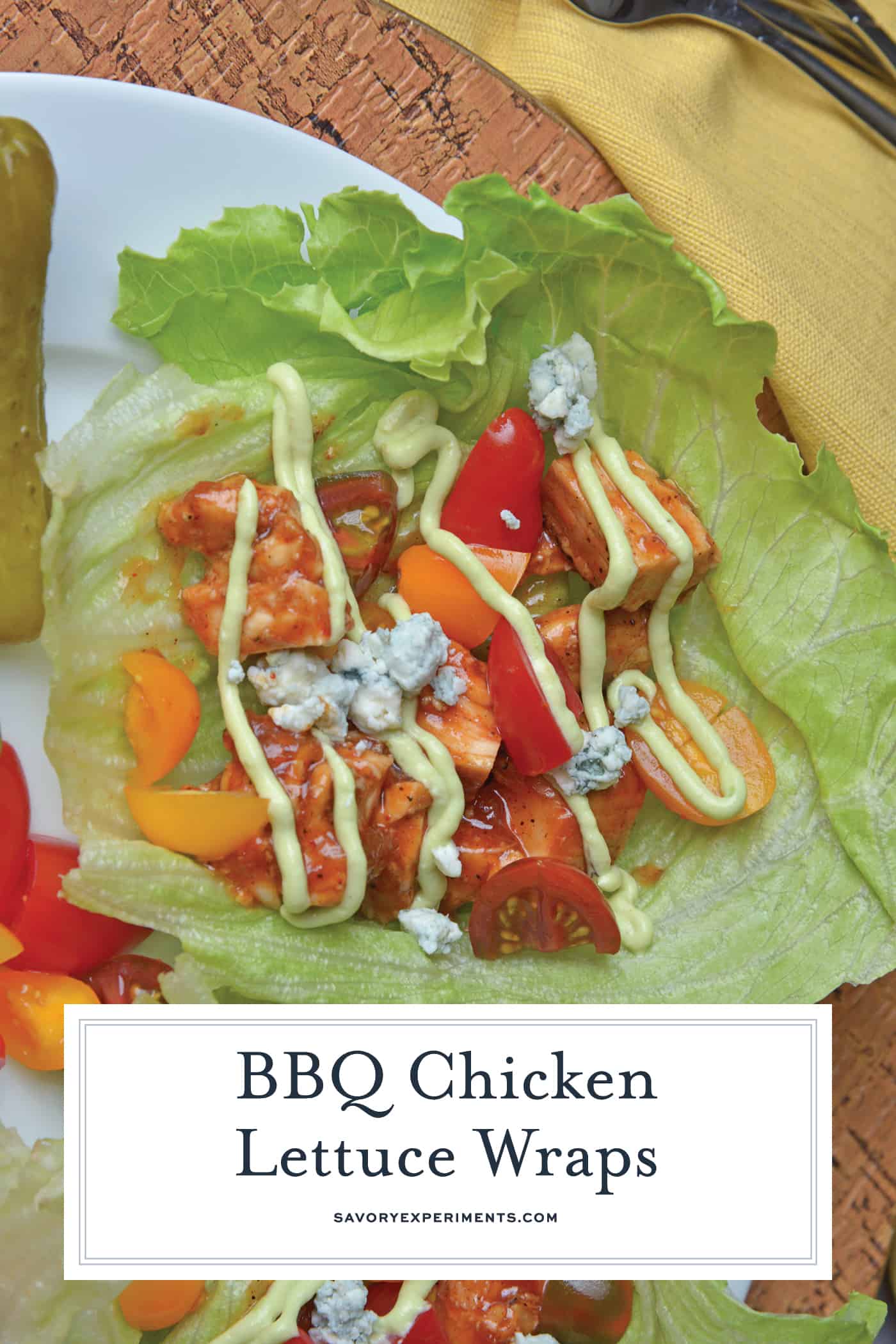 BBQ Chicken Lettuce Wraps use seasoned chicken with your favorite BBQ sauce and wrap them in crispy lettuce with juicy tomatoes, blue cheese and cool avocado dressing. #lettucewraps www.savoryexperiments.com