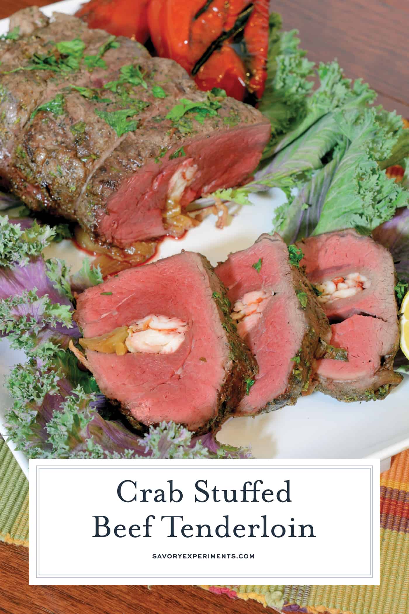 Crab Stuffed Beef Tenderloin takes a tenderloin and fills the center with buttered crab and caramelized onions, then baked to perfection with a black pepper bark.Ā #beeftenderloinrecipe www.savoryexperiments.com