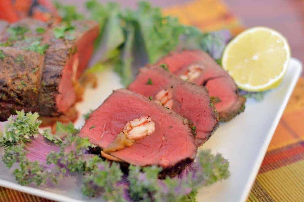 Crab Stuffed Beef Tenderloin- worthy of a special occasion and easy to make, pin NOW for Valentine's Day! #beeftenderloin www.savoryexperiments.com