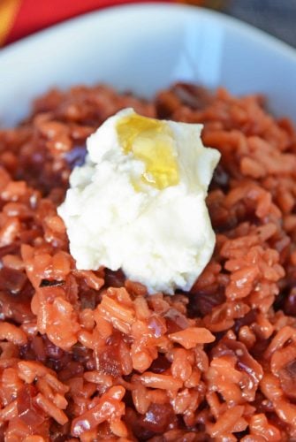 Beet Risotto is an easy risotto recipe that uses beets, shallots and garlic for a vibrant dish. Top with cool ricotta and honey. #beetrisotto #howtomakerisotto www.savoryexperiments.com
