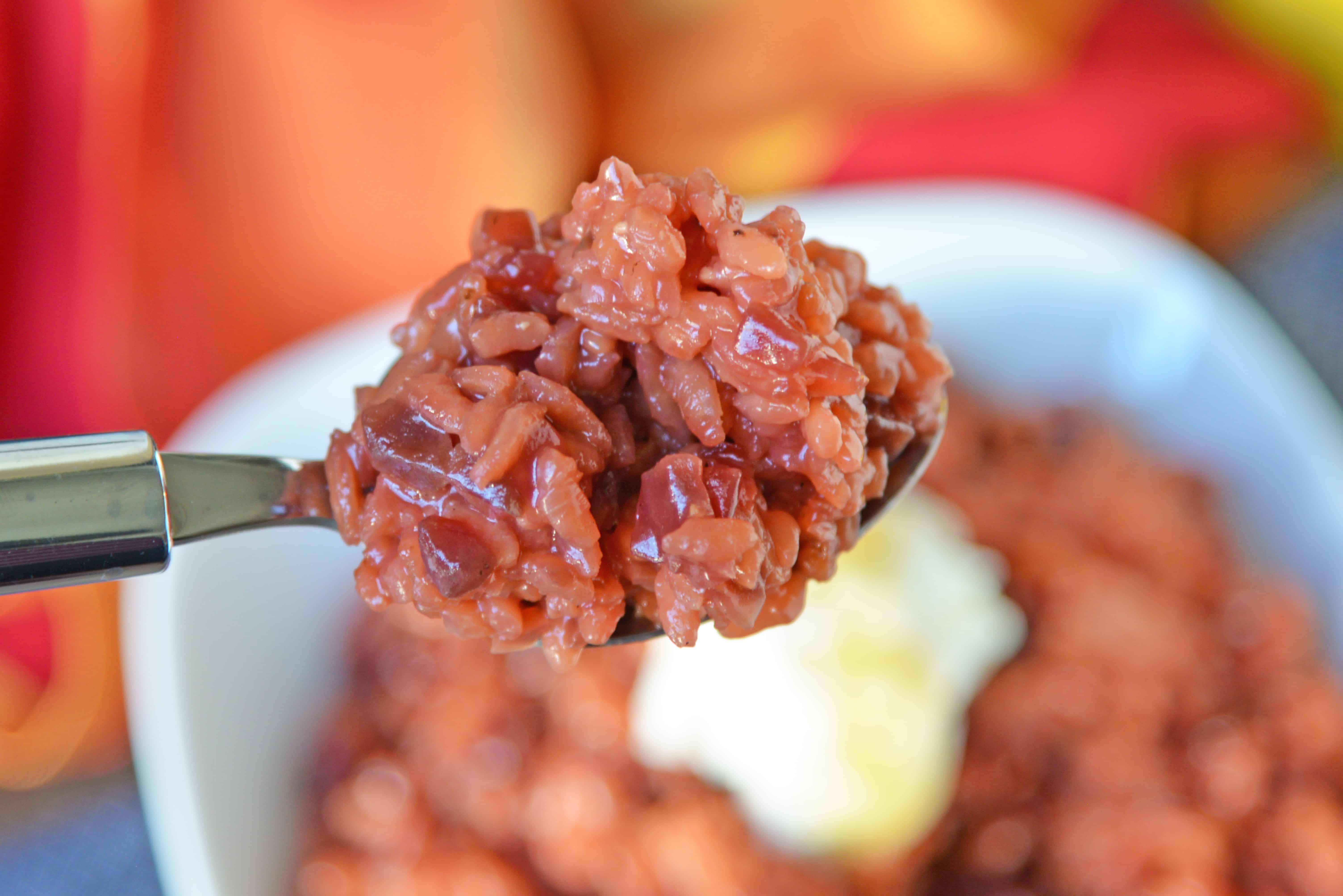 Beet Risotto is an easy risotto recipe that uses beets, shallots and garlic for a vibrant dish. Top with cool ricotta and honey. #beetrisotto #howtomakerisotto www.savoryexperiments.com 