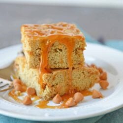 Soft Butterscotch Blondies are soft brown butter brownies loaded with butterscotch chips and drizzled with salted caramel sauce. #brownbutterbrownies #butterscotchbrownies www.savoryexperiments.com