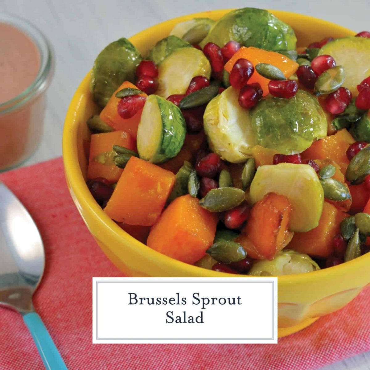 Brussels Sprout Salad Recipe is colorful and the perfect blend of sweet, salty, and savory. This dish is sure to have your guests going back for seconds. #brusselssprouts #sidedish #sweetandsavory www.savoryexperiments.com